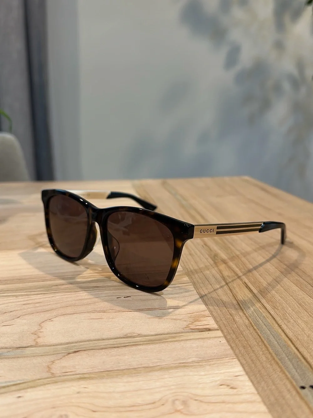 New Gucci Black Sunglasses with Gold Temple Accents